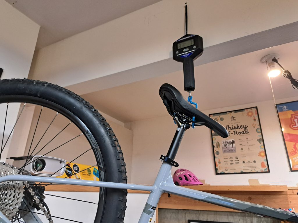 polygon xtrada hanging from a bike scale