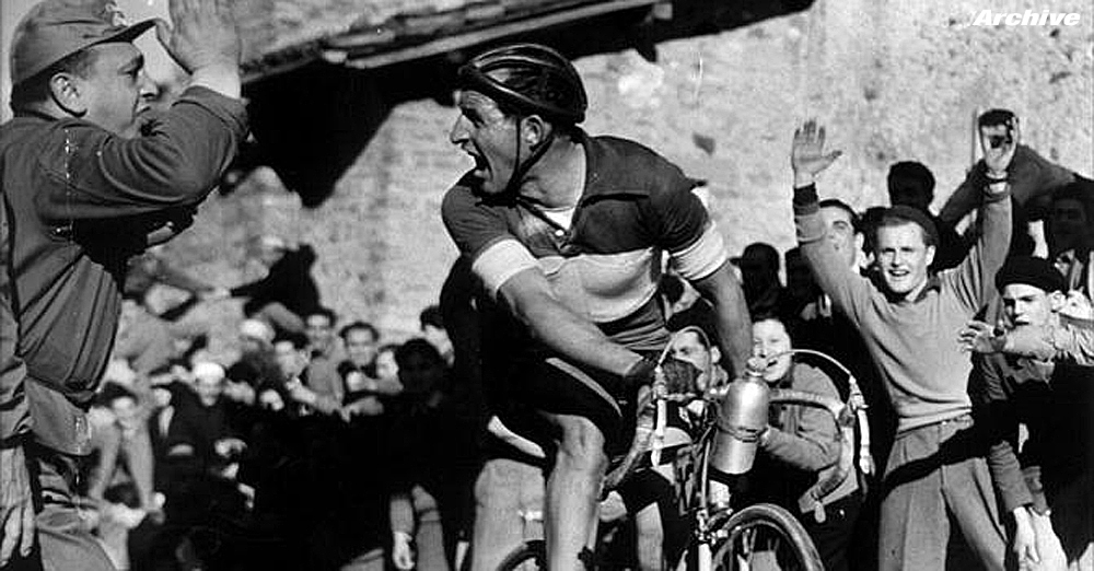 The 1952 Giro di Lombardia was the usual battle between Fausto Coppi and Gino Bartali (above). But they were too busy looking at each other they finished 35th and 36th, the last two riders in the chase group at 54 seconds. Giuseppe Minardi (Legnano) was the winner. Read all about the 1952 Giro di Lombardia race program HERE.